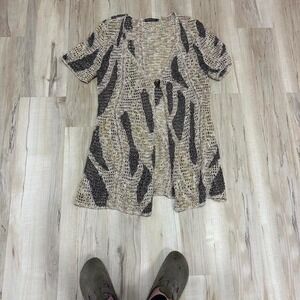 Zozo Tan and black crochet cardigan with a boho vibe